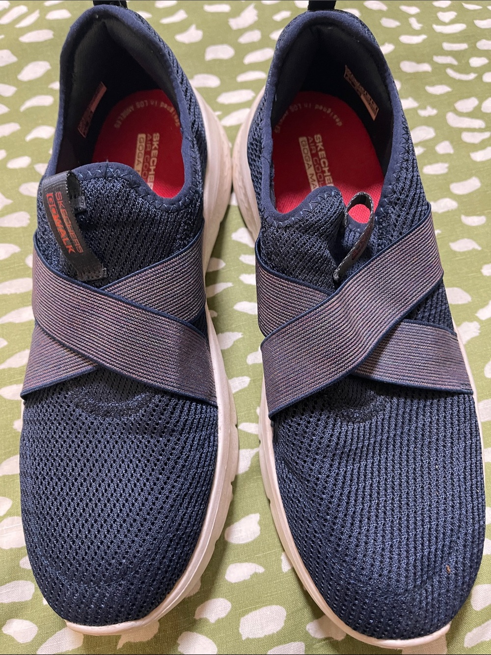 Skechers women’s Navy Slip-On Cross-Strap Sneakers